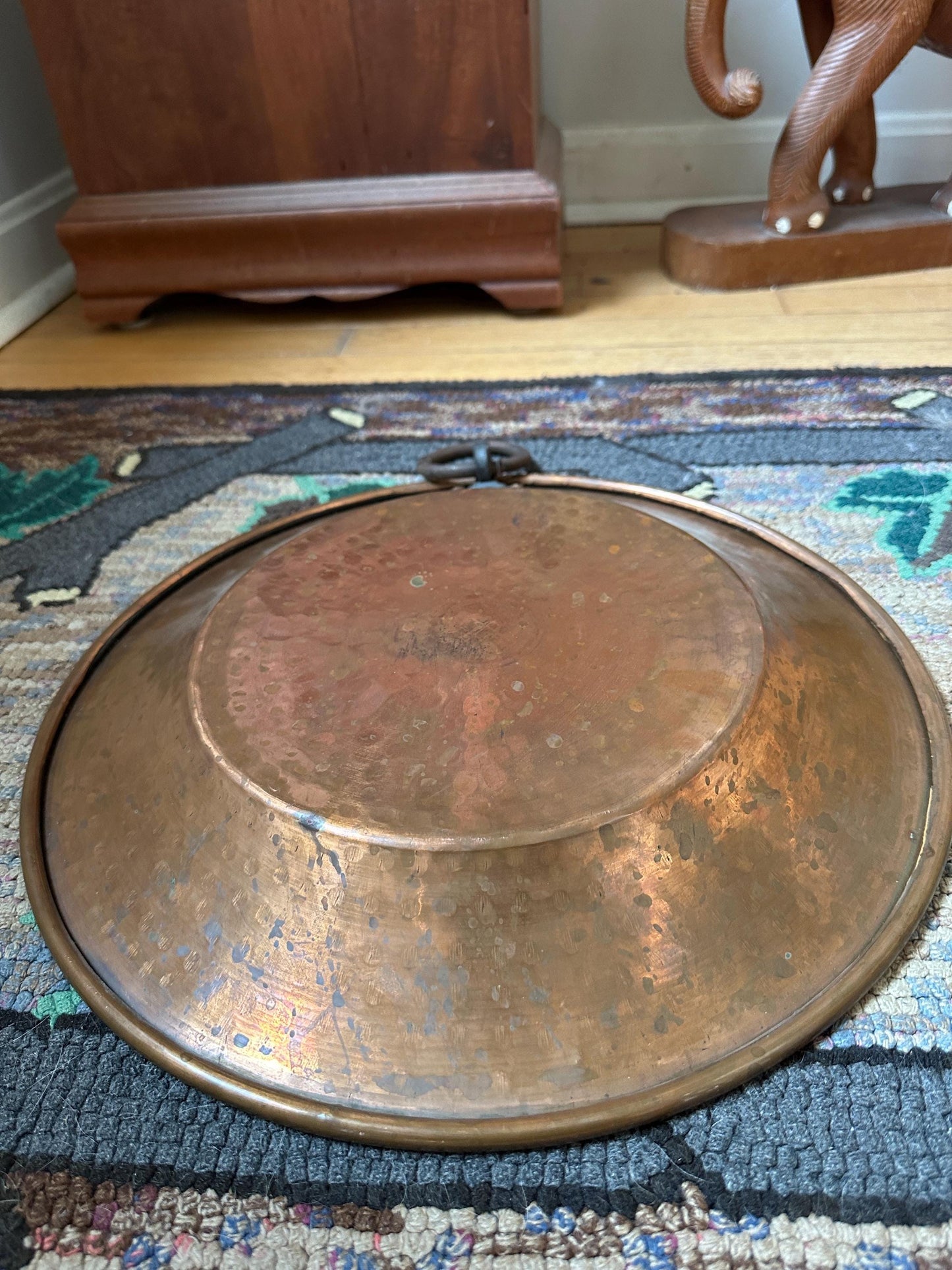 Large hand-hammered vintage Arts and Crafts copper plate tray or charger w Ring for Hanging, the early 20th century
