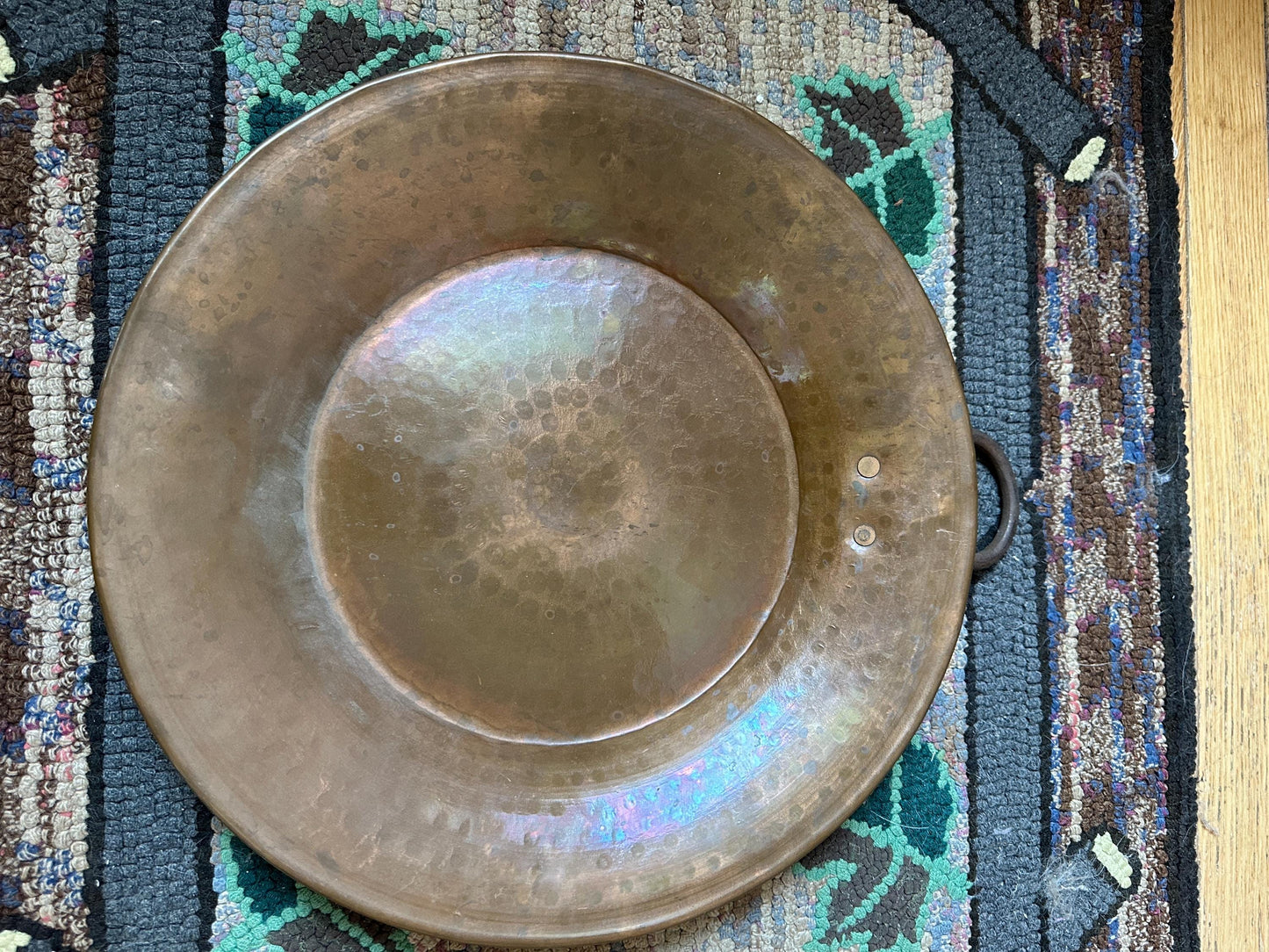 Large hand-hammered vintage Arts and Crafts copper plate tray or charger w Ring for Hanging, the early 20th century