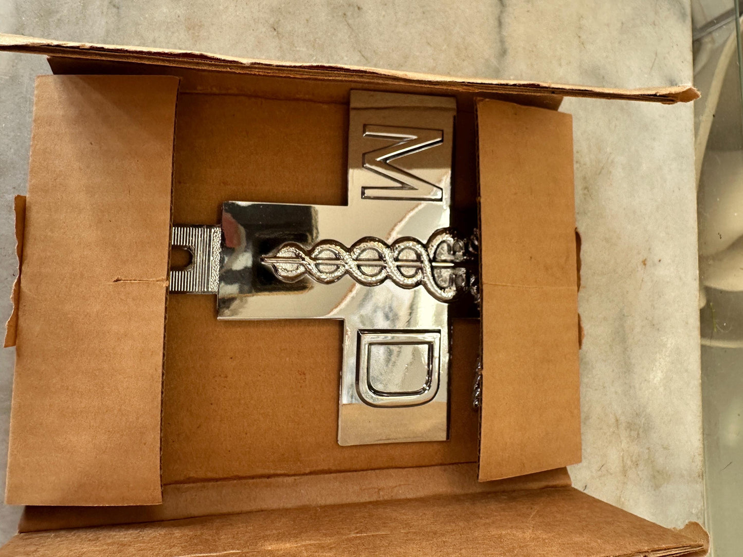 1960s Chrome MD Doctor License Plate Badge – New Old Stock Car Emblem