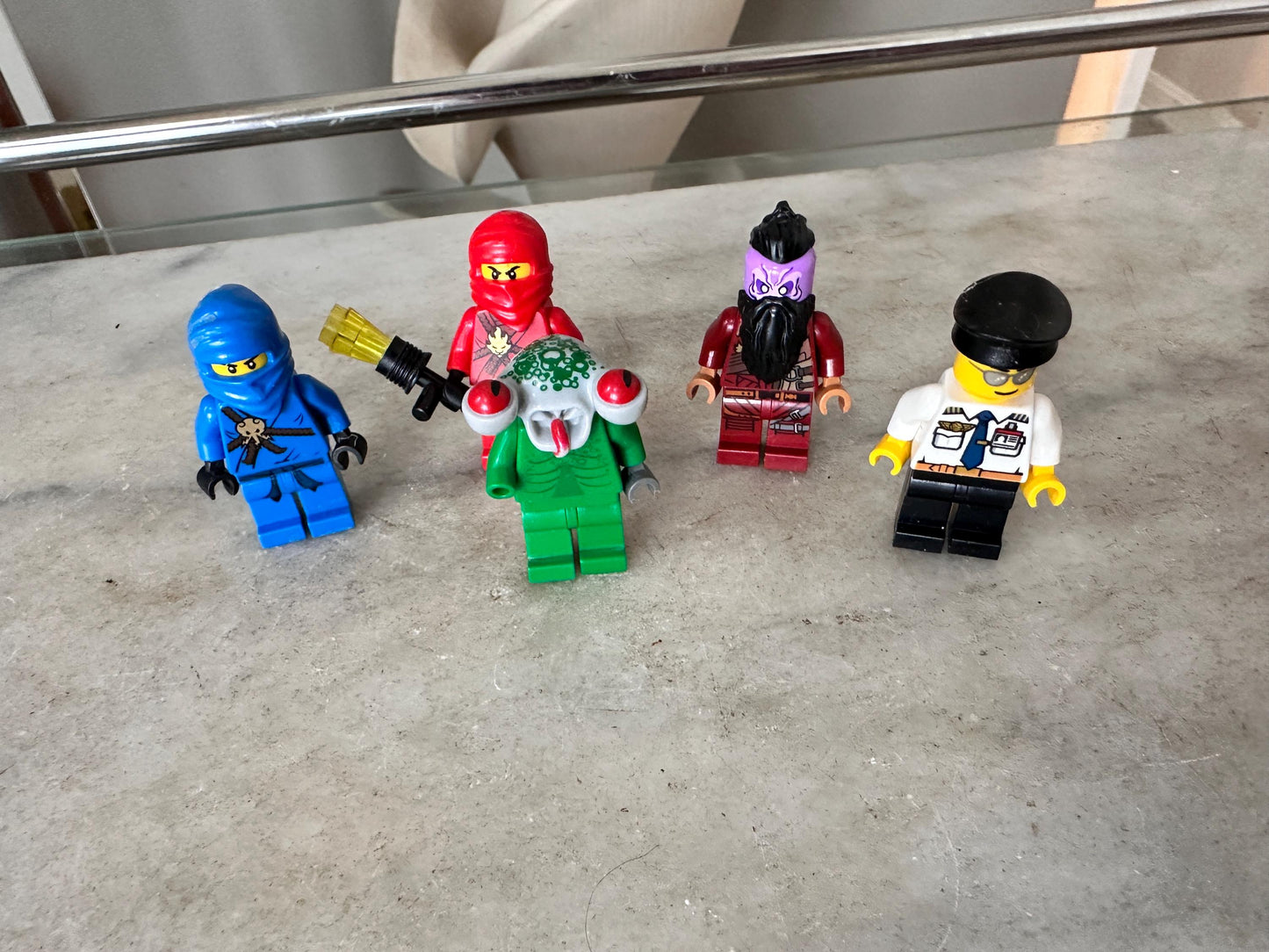 Assorted LEGO Minifigure Lot of 5 – Space Police Squidman, Marvel Taserface, Ninjago Jay (Blue & Red), and Airport Pilot