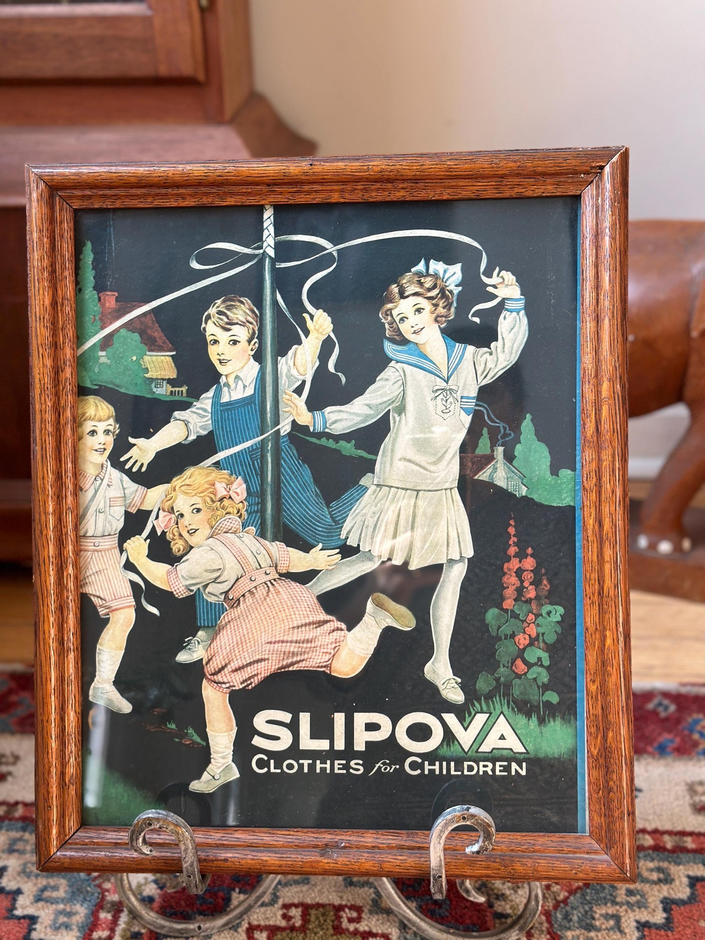 Framed Slipova Children's Clothing Ad Print – Vintage Nursery Wall Art 16” x 13”