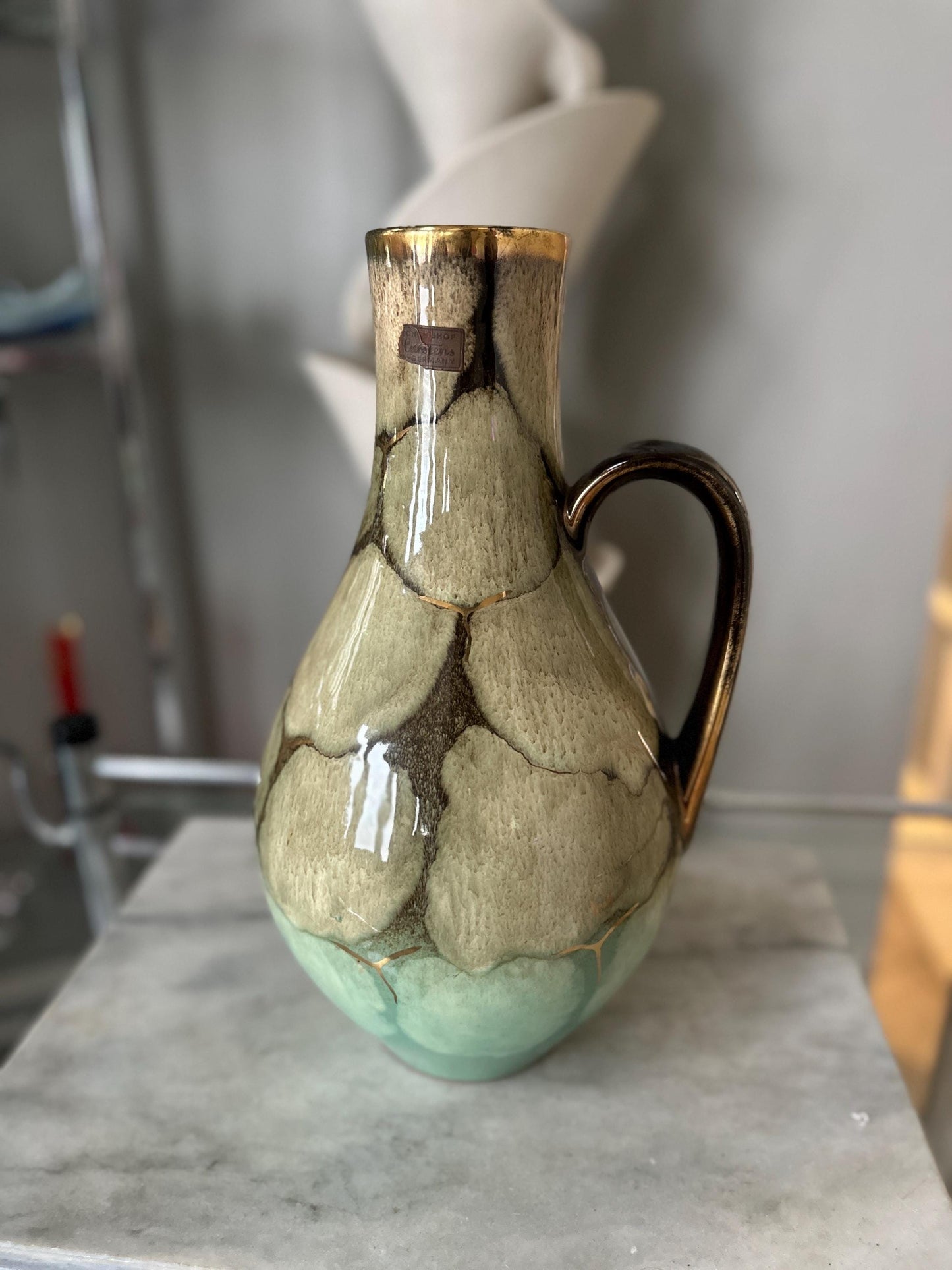 West German Carstens Tonnieshof tall handled vase, glossy green, brown and gold | Mid Century Modern Carstens Pitcher Vase