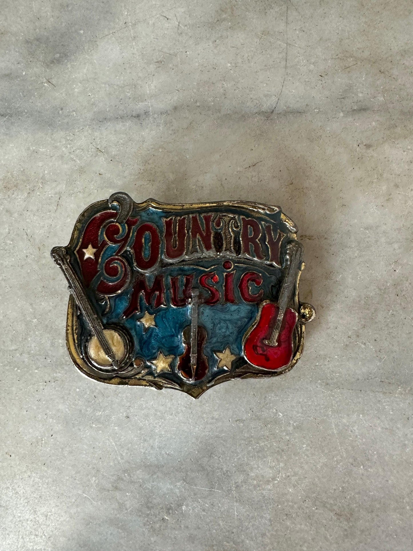 1982 Enameled Country Music Buckle ~ Serial Number H919 ~ The Great American Buckle Co U.S.A. Copyright 1982 Made in the U.S.A.