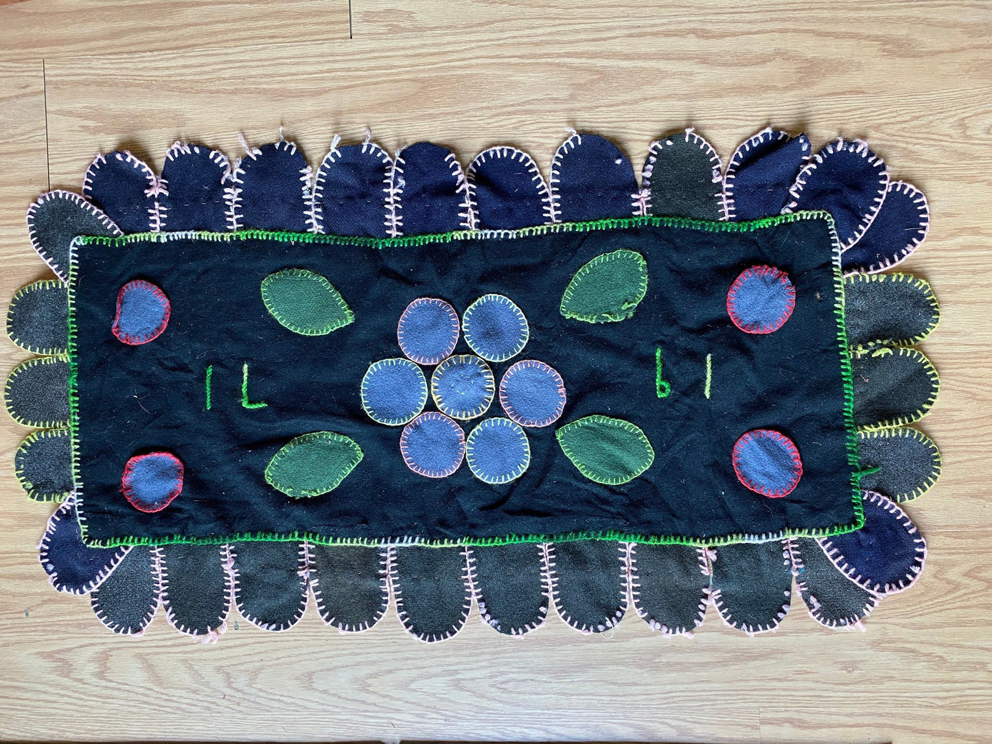 Vintage 1971 Wool Patchwork Rug | Hand-stitched Flower Petal Design