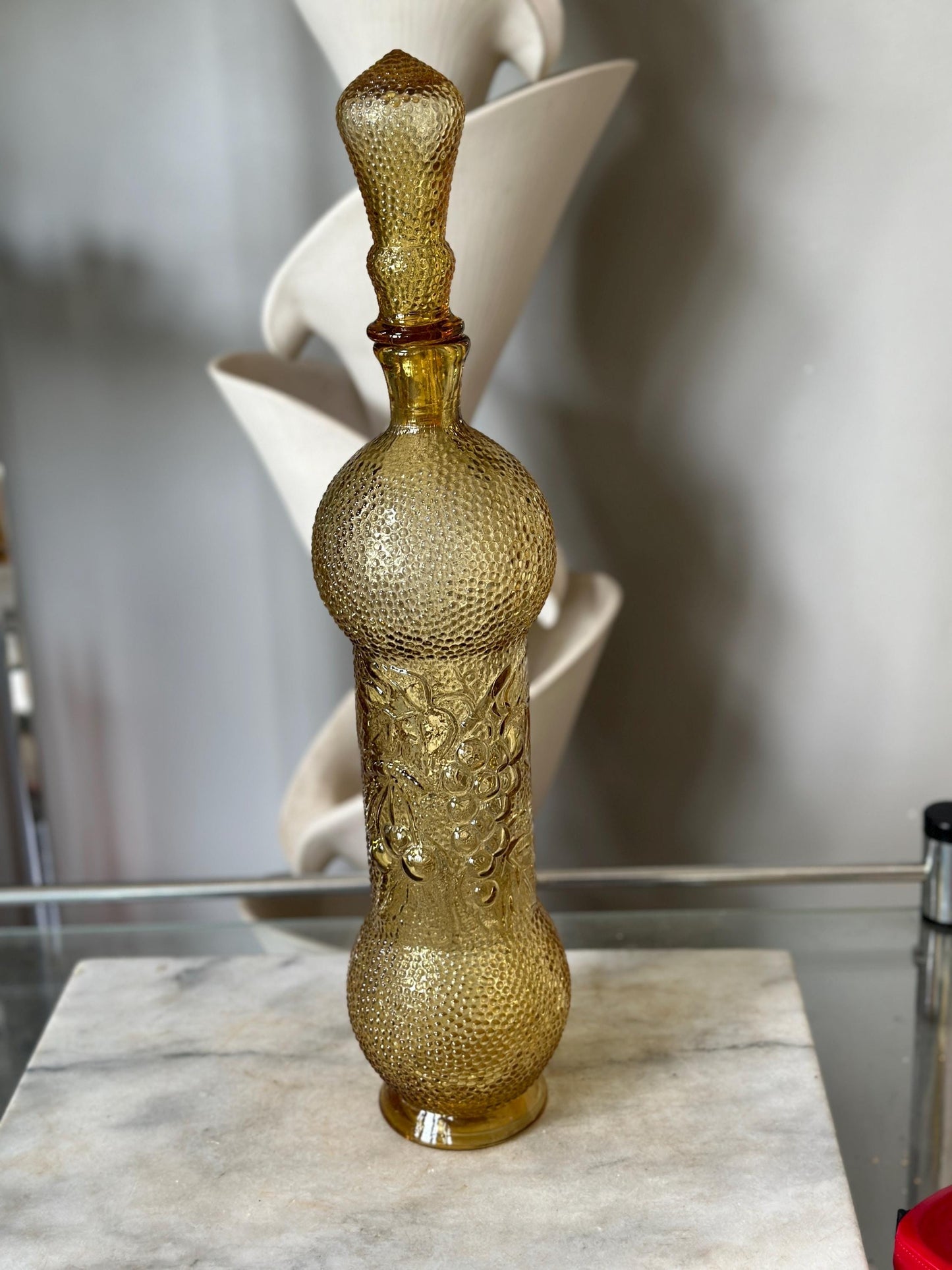 Vintage Empoli Honey Amber Decanter: Hobnail Glass with Embossed Grapes