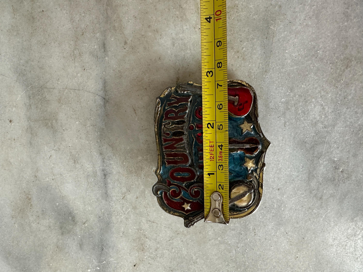 1982 Enameled Country Music Buckle  ~  Serial Number H919  ~  The Great American Buckle Co U.S.A.  Copyright 1982  Made in the U.S.A.