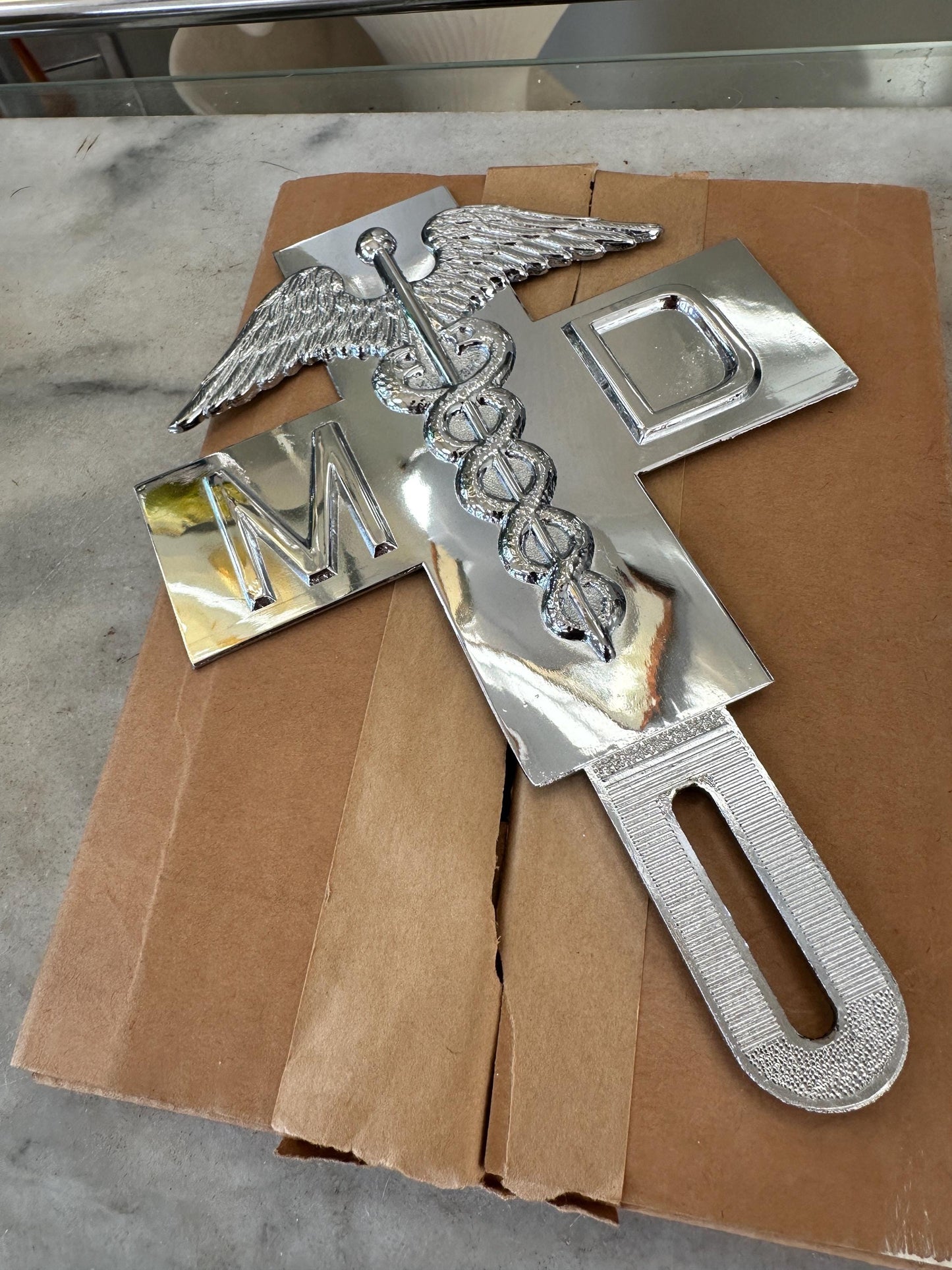 1960s Chrome MD Doctor License Plate Badge – New Old Stock Car Emblem