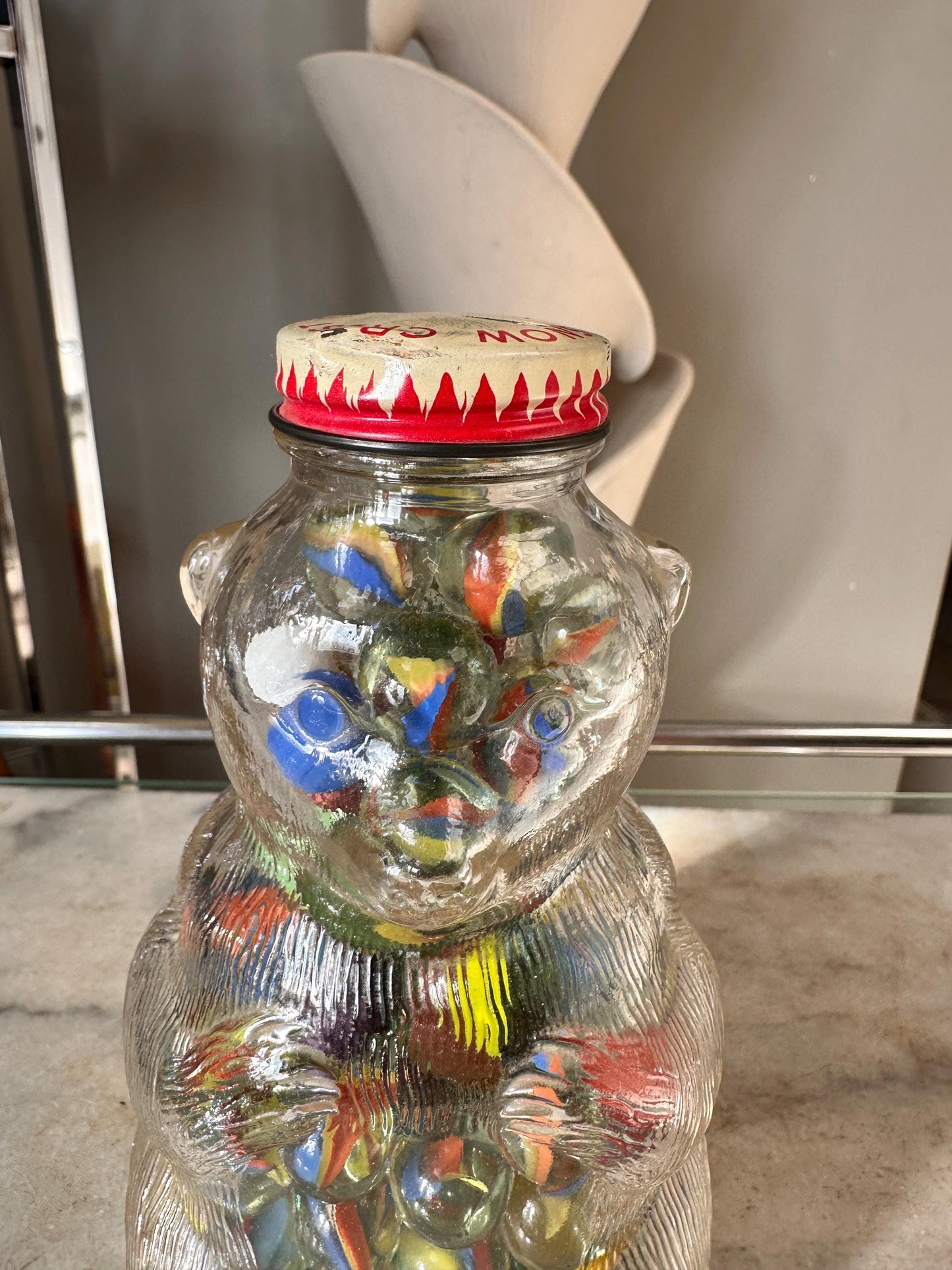 Vintage Snow Crest Glass Bear Bottle Bank with Marbles: Cat Eye Shooters
