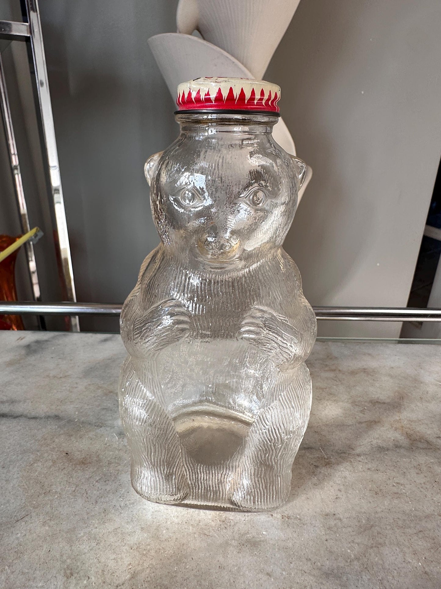 Vintage Snow Crest Glass Bear Bottle Bank with Marbles: Cat Eye Shooters