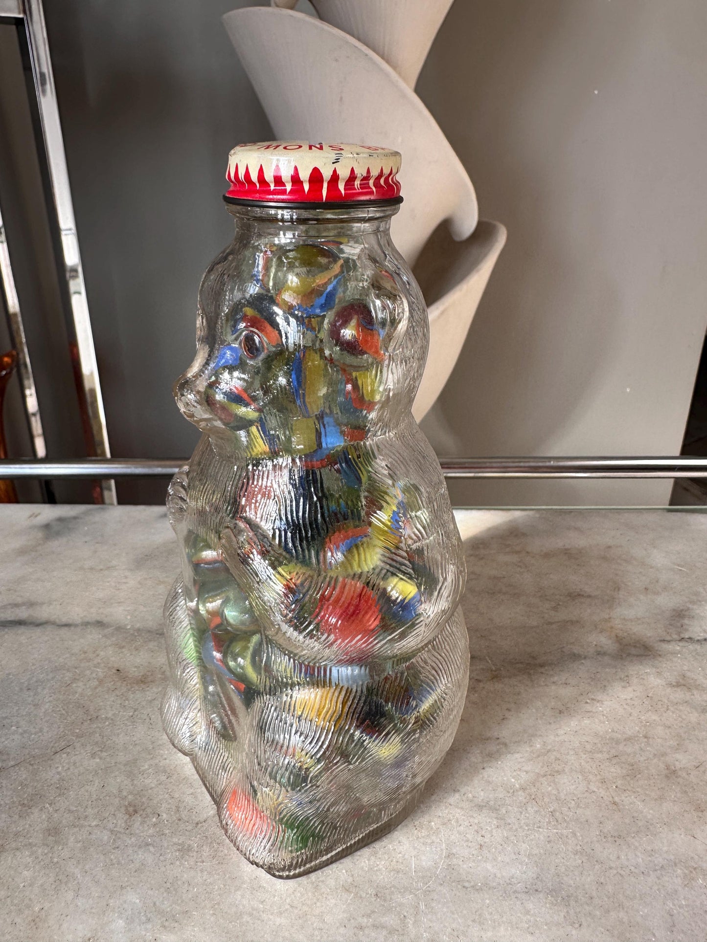 Vintage Snow Crest Glass Bear Bottle Bank with Marbles: Cat Eye Shooters