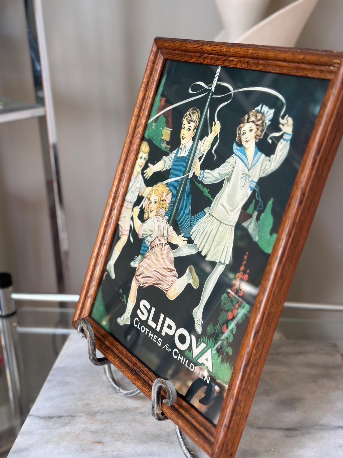 Framed Slipova Children's Clothing Ad Print – Vintage Nursery Wall Art 16” x 13”