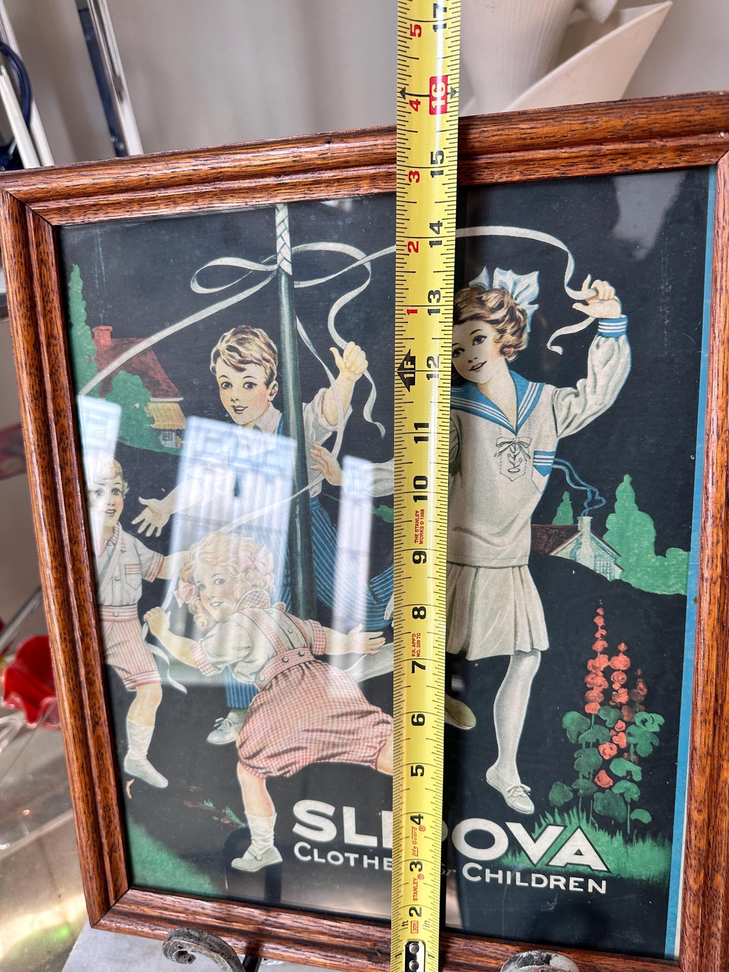Framed Slipova Children's Clothing Ad Print – Vintage Nursery Wall Art 16” x 13”