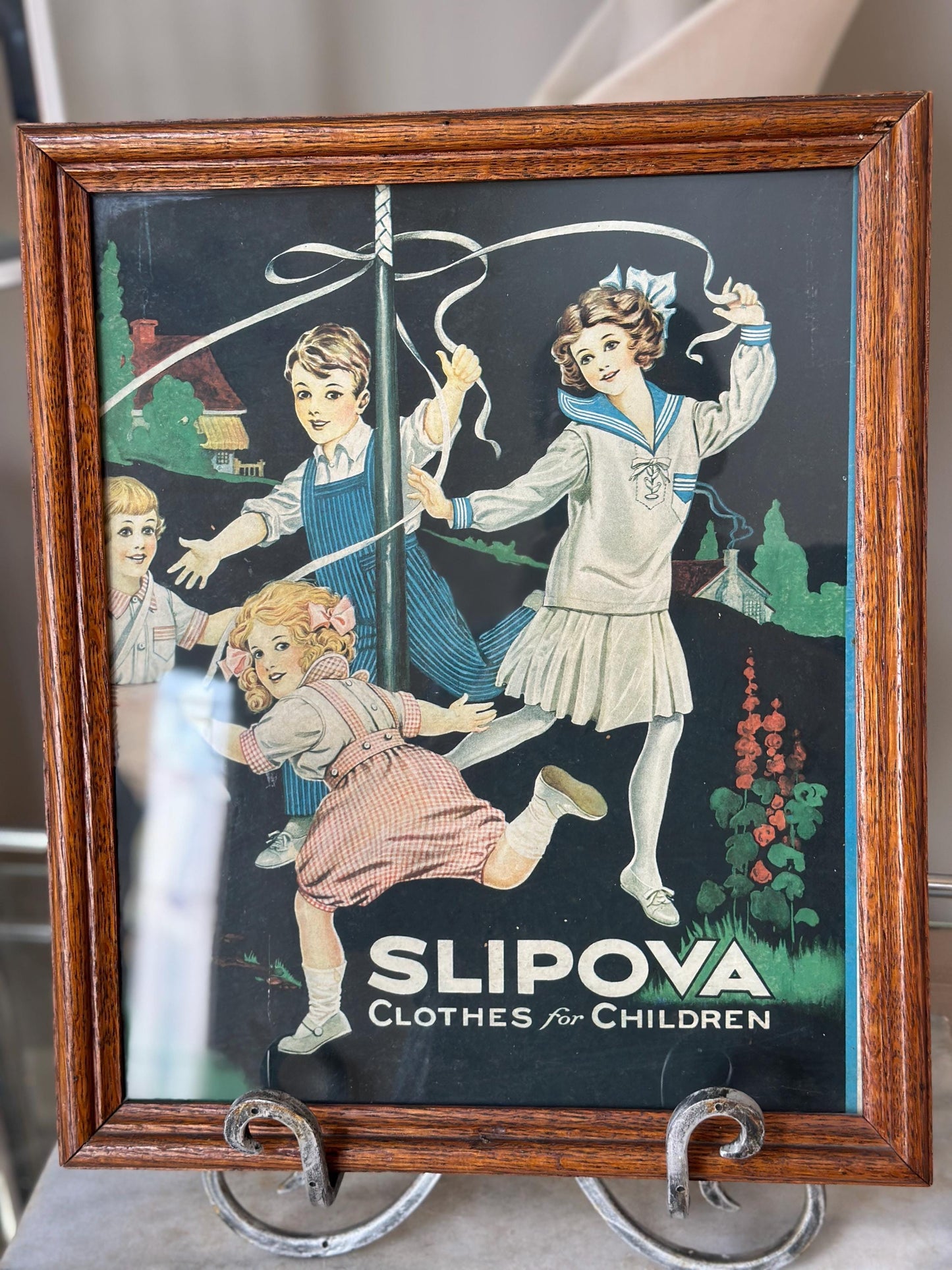 Framed Slipova Children's Clothing Ad Print – Vintage Nursery Wall Art 16” x 13”
