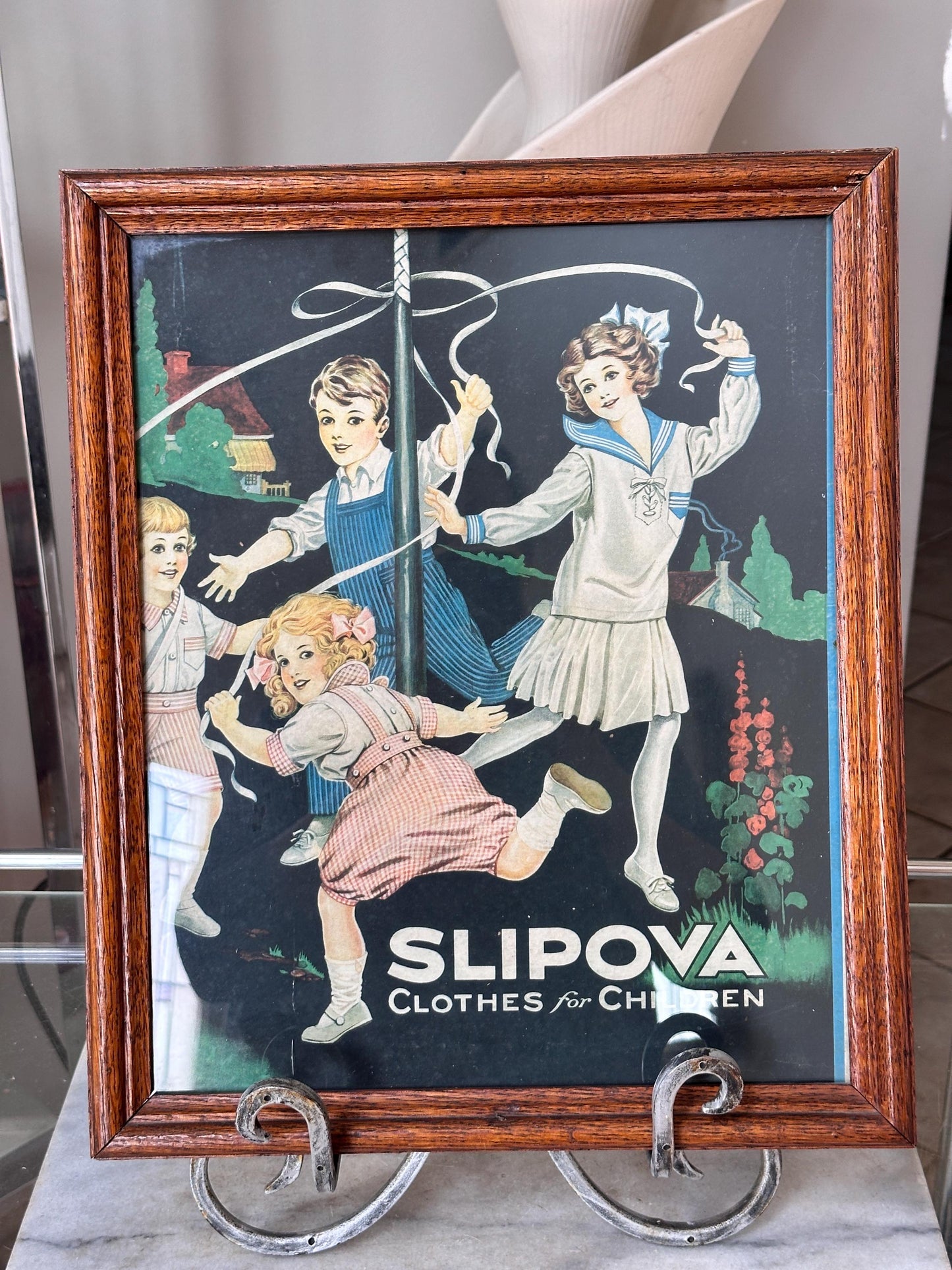 Framed Slipova Children's Clothing Ad Print – Vintage Nursery Wall Art 16” x 13”