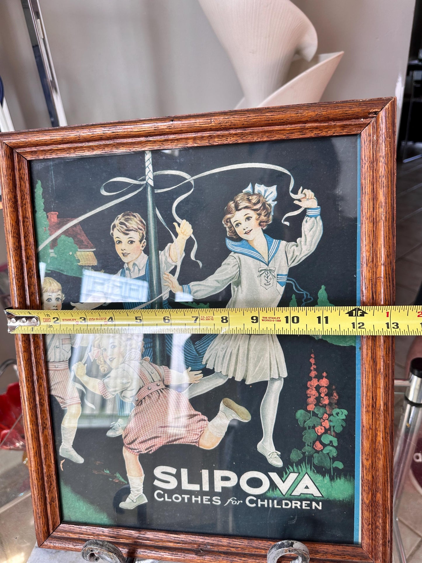 Framed Slipova Children's Clothing Ad Print – Vintage Nursery Wall Art 16” x 13”