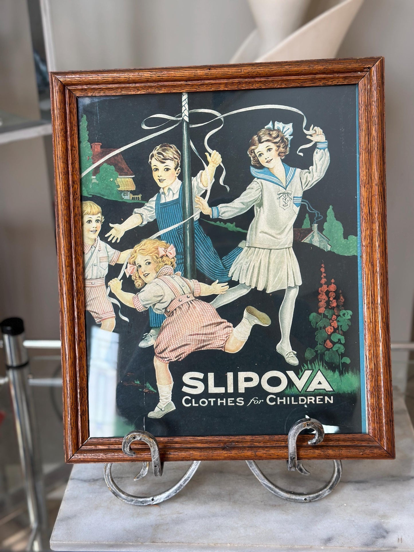 Framed Slipova Children's Clothing Ad Print – Vintage Nursery Wall Art 16” x 13”