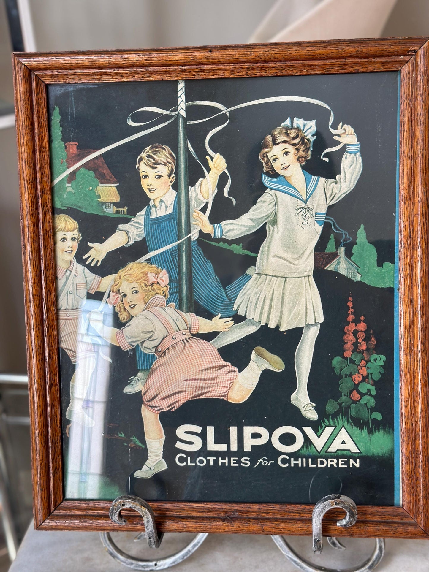 Framed Slipova Children's Clothing Ad Print – Vintage Nursery Wall Art 16” x 13”
