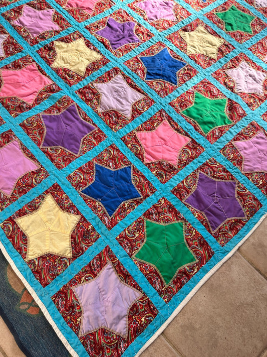 1980s Hand-Stitched Star Quilt – Multicolor Cotton, Paisley Background, Turquoise Border (67" x 77")