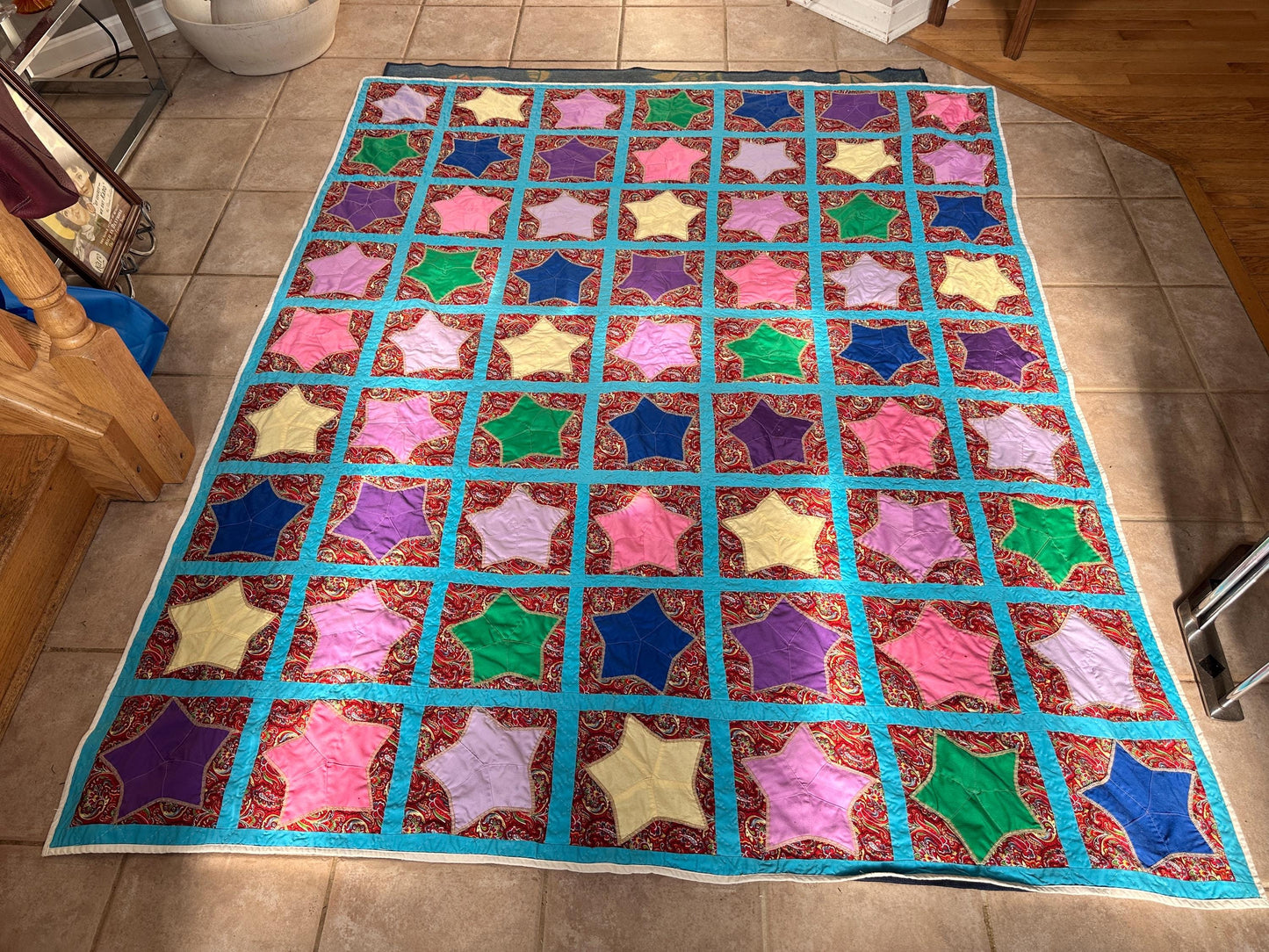 1980s Hand-Stitched Star Quilt – Multicolor Cotton, Paisley Background, Turquoise Border (67" x 77")