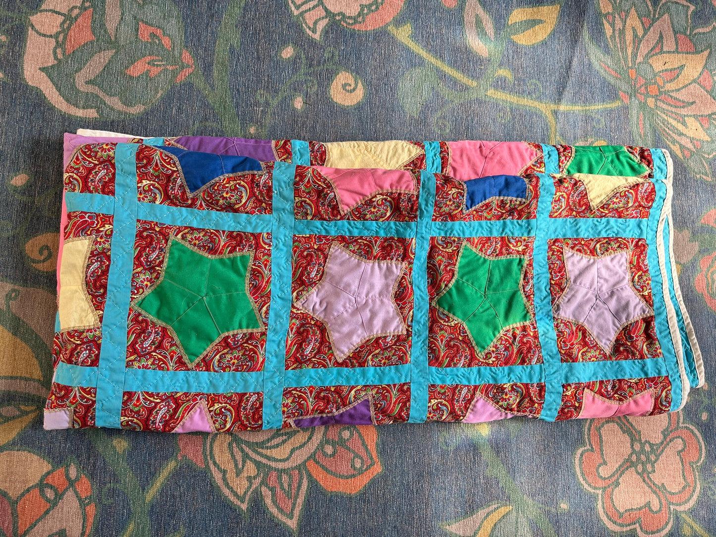 1980s Hand-Stitched Star Quilt – Multicolor Cotton, Paisley Background, Turquoise Border (67" x 77")