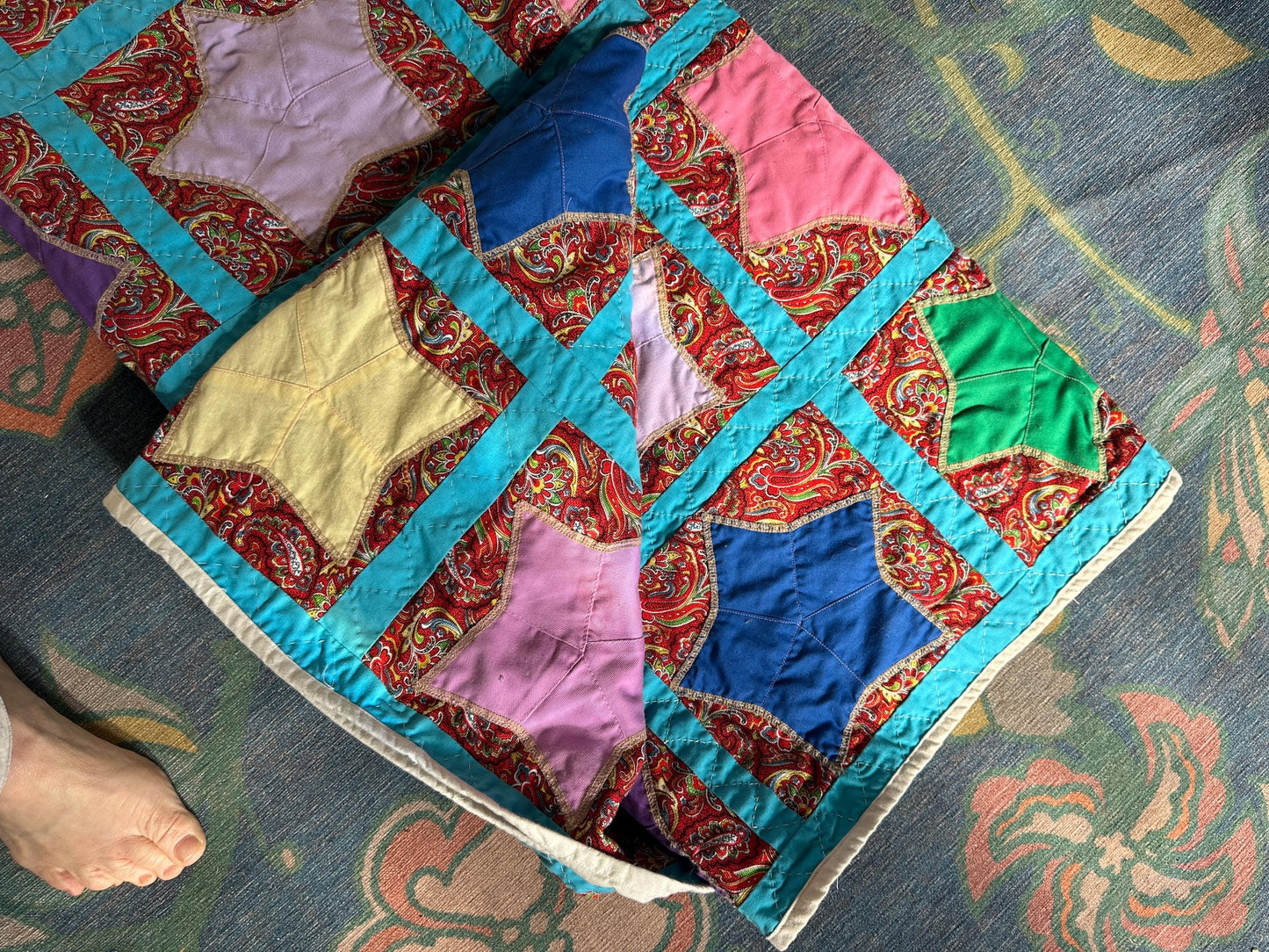 1980s Hand-Stitched Star Quilt – Multicolor Cotton, Paisley Background, Turquoise Border (67" x 77")