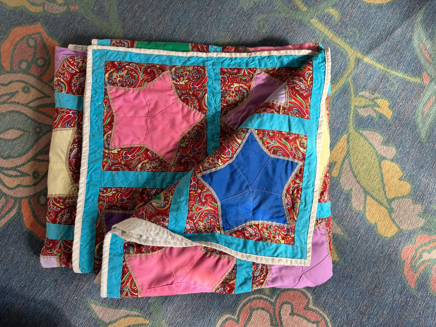 1980s Hand-Stitched Star Quilt – Multicolor Cotton, Paisley Background, Turquoise Border (67" x 77")