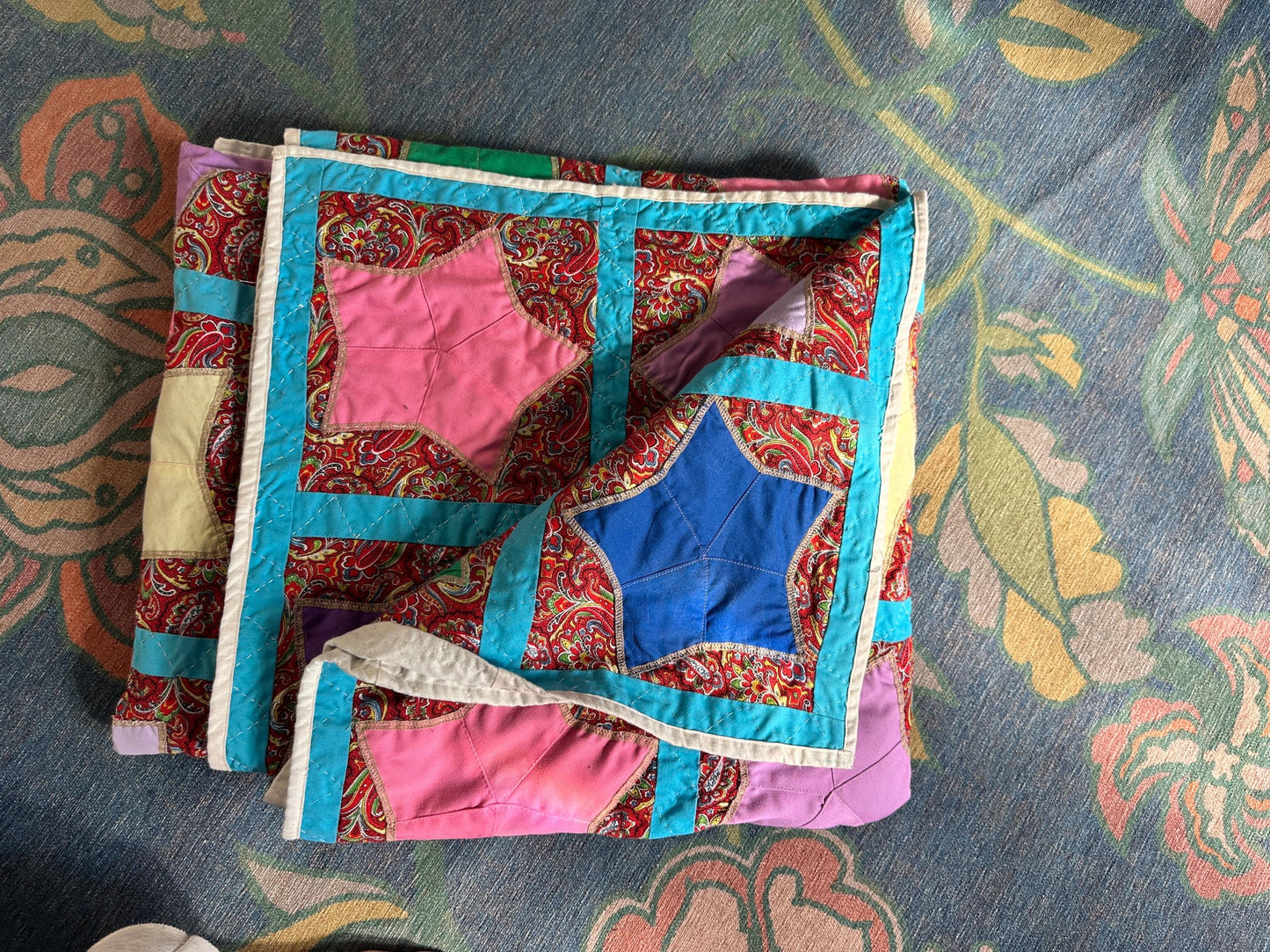 1980s Hand-Stitched Star Quilt – Multicolor Cotton, Paisley Background, Turquoise Border (67" x 77")