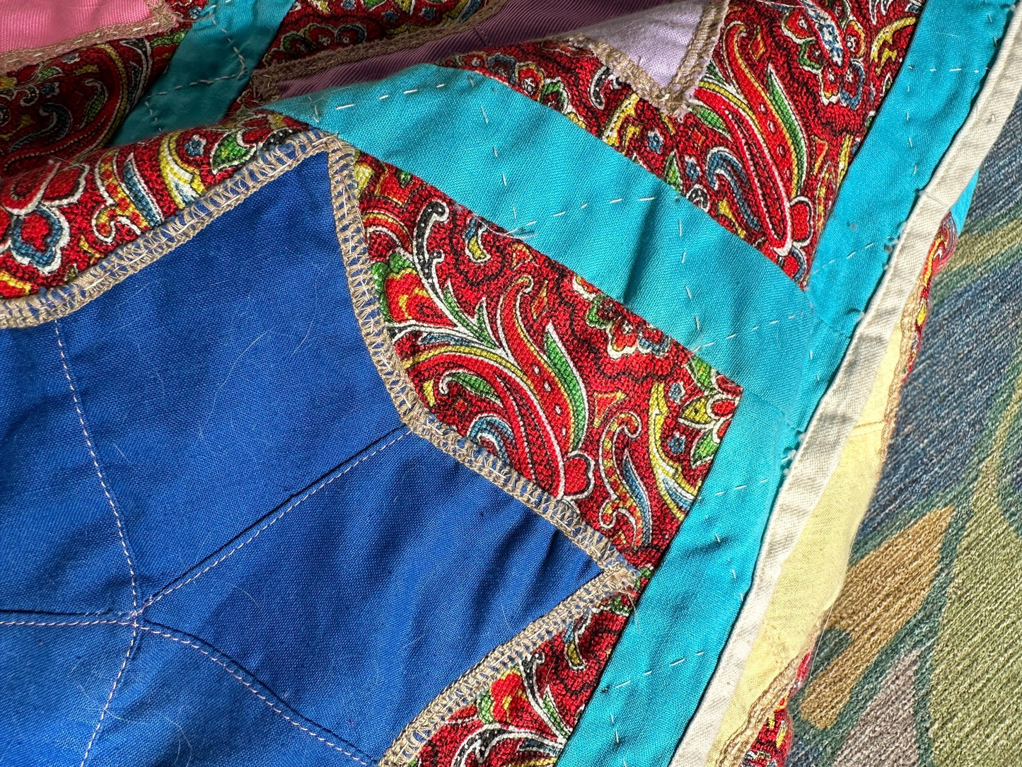 1980s Hand-Stitched Star Quilt – Multicolor Cotton, Paisley Background, Turquoise Border (67" x 77")