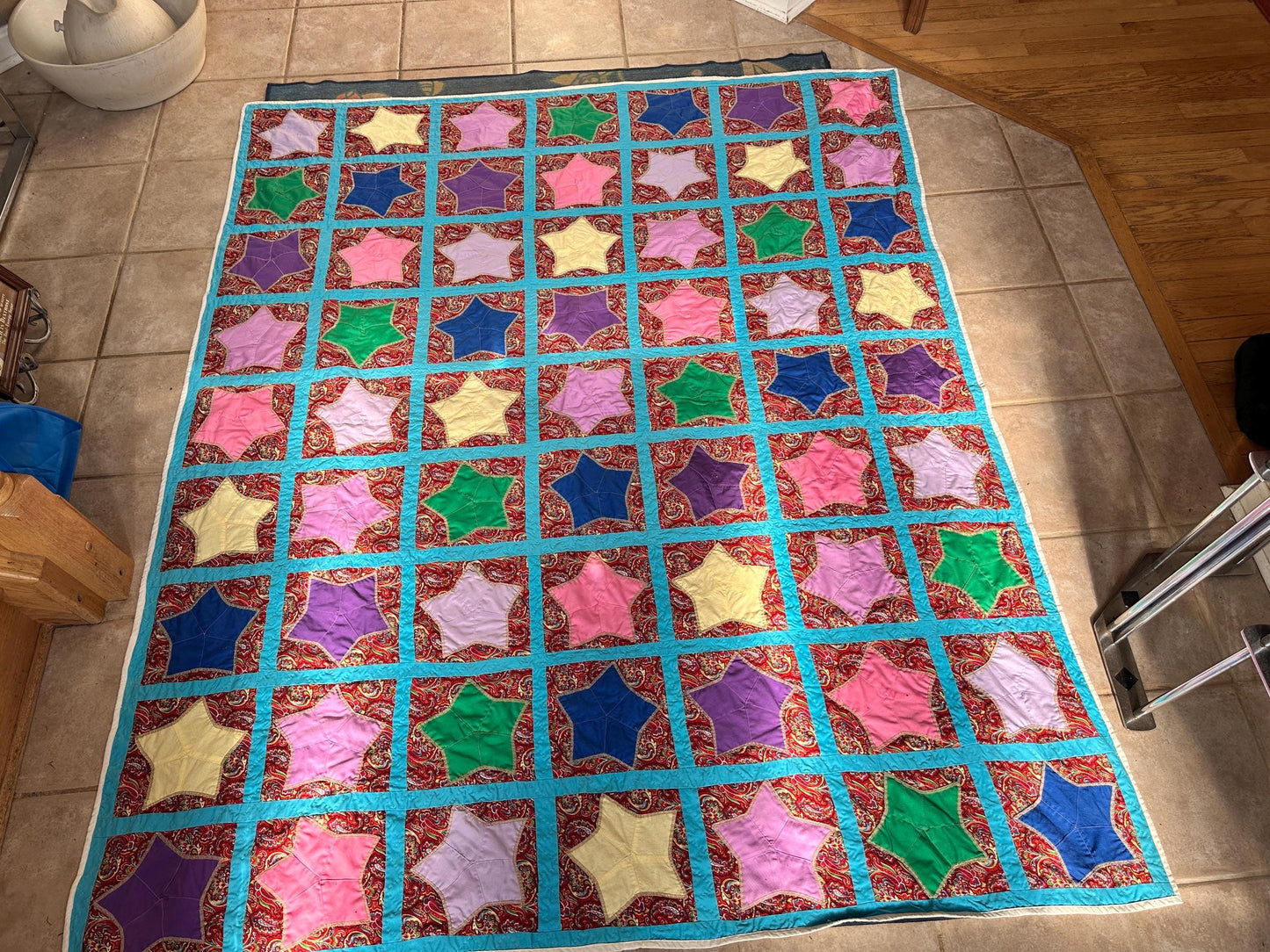 1980s Hand-Stitched Star Quilt – Multicolor Cotton, Paisley Background, Turquoise Border (67" x 77")