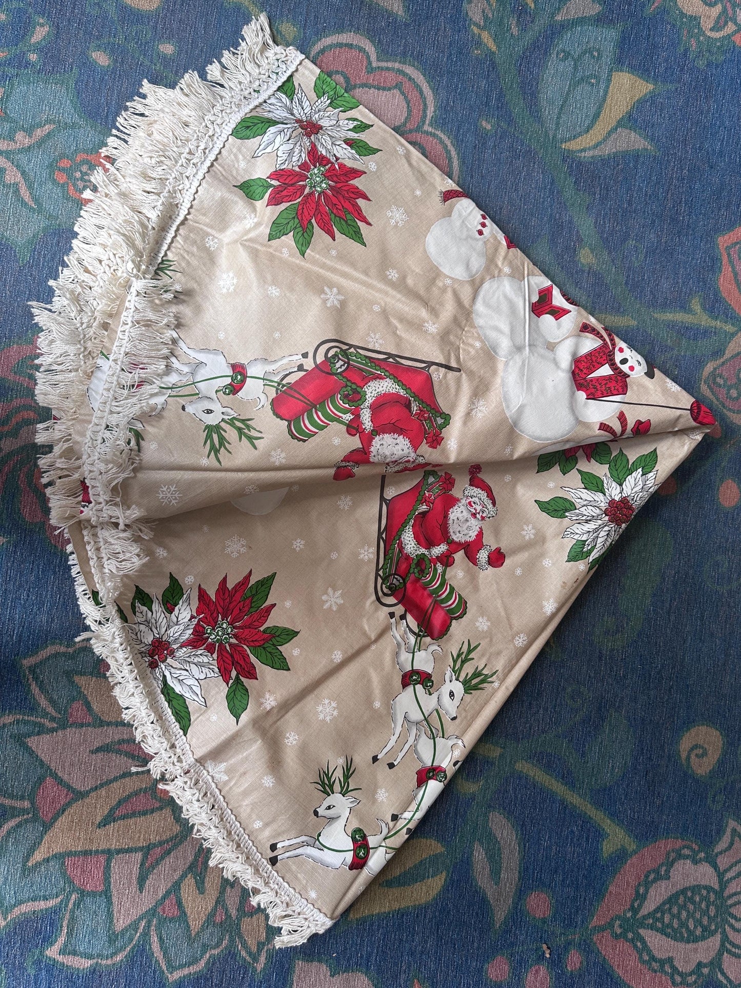 Vintage Kitschy Christmas Round Vinyl Tablecloth | Santa, Snowy Winter & Poinsettia Holiday Print | 60” with White Trim | Retro Holiday Deco
