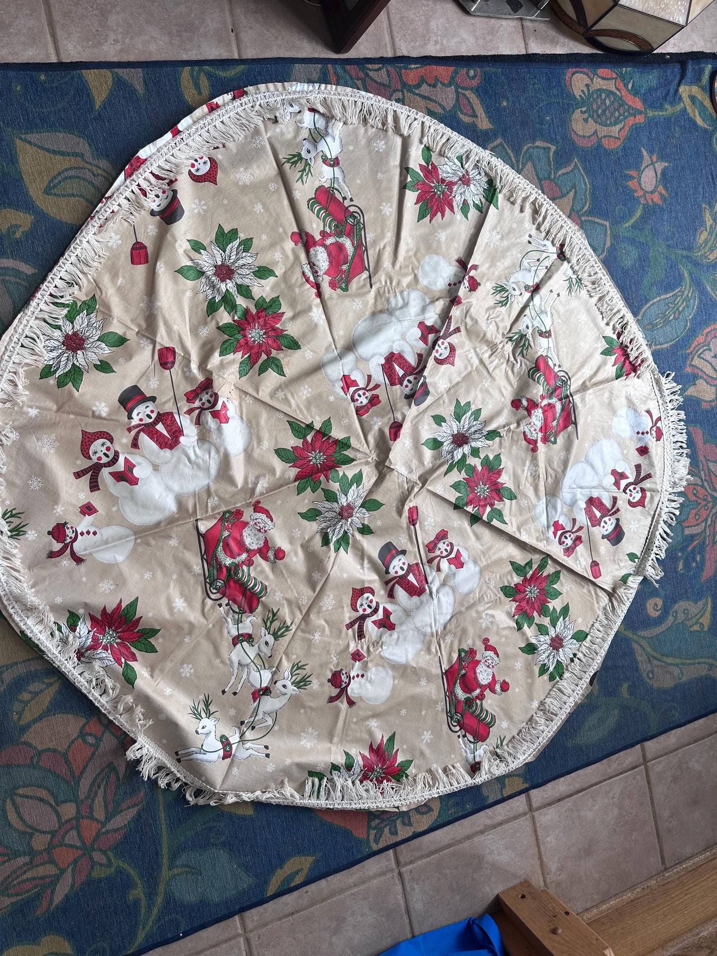 Vintage Kitschy Christmas Round Vinyl Tablecloth | Santa, Snowy Winter & Poinsettia Holiday Print | 60” with White Trim | Retro Holiday Deco