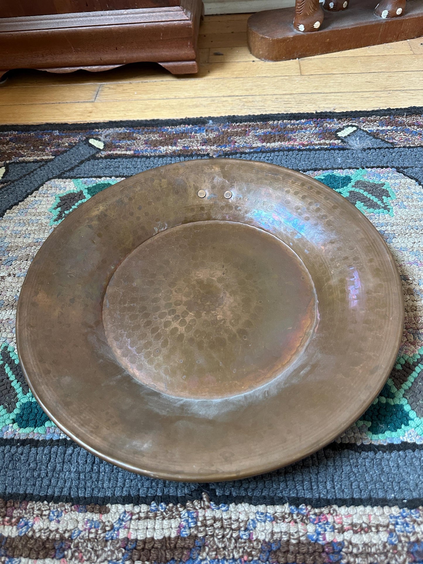 Large hand-hammered vintage Arts and Crafts copper plate tray or charger w Ring for Hanging,  the early 20th century