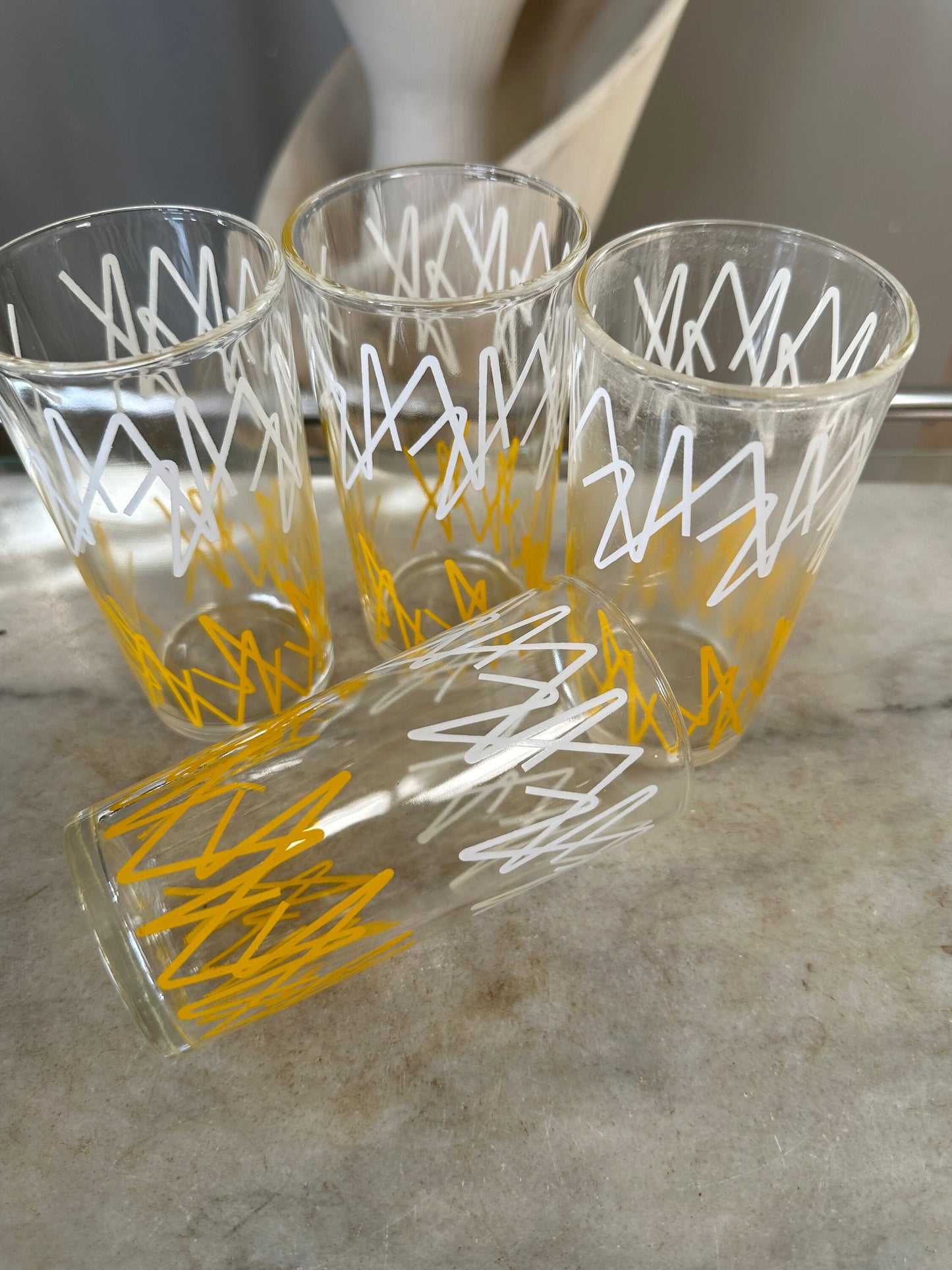 Vintage MCM Dominion Glass 8oz drinking glasses with yellow and white zig zag pattern set of four