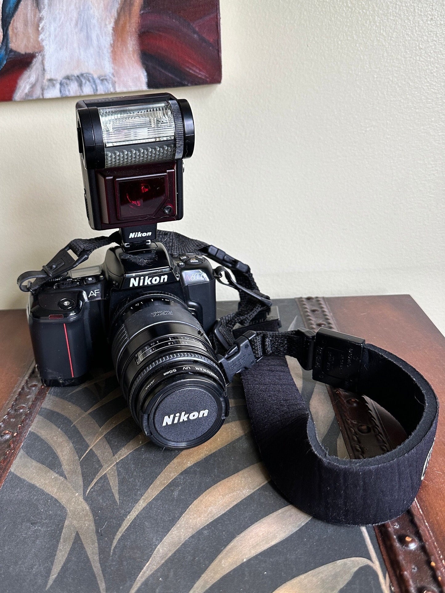 Nikon 2006 35mm SLR Film Camera with 50 mm lens | Also Includes Oshawa 80-205 mm Zoom Lens, 1 Flash, Toshiba Light, Case