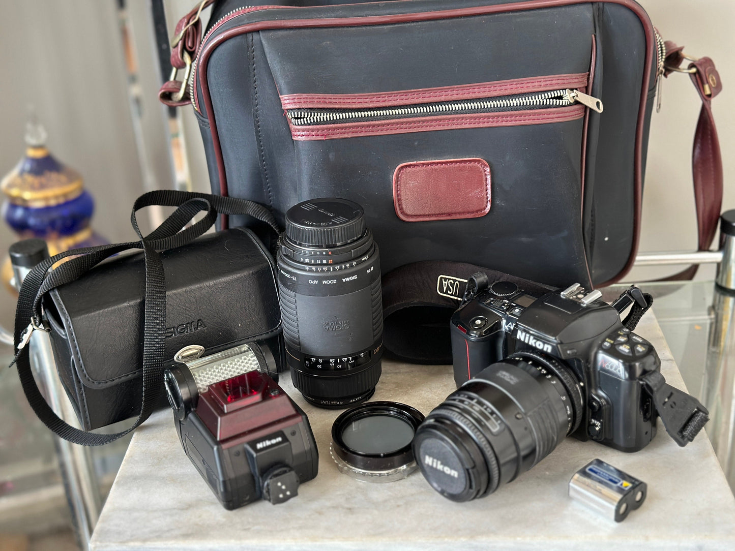 Nikon 2006 35mm SLR Film Camera with 50 mm lens | Also Includes Oshawa 80-205 mm Zoom Lens, 1 Flash, Toshiba Light, Case